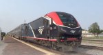 Amtrak 390 with one of the long distant chargers